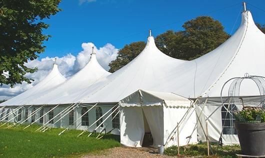 portable restroom units set up at a music festival, offering attendees a convenient and sanitary solution for bathroom needs in Somerset